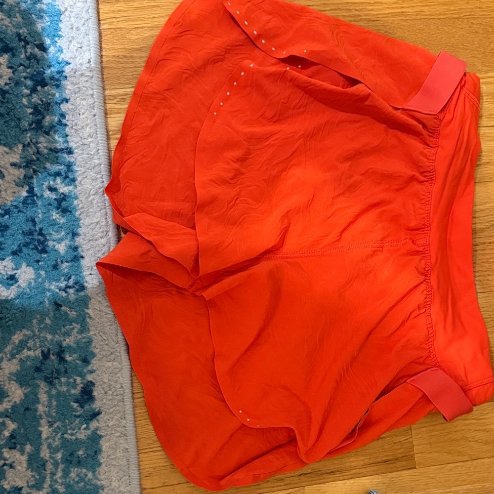 bright orange lululemon fast and free shorts